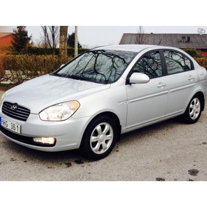 Hyundai accent 1,6 m-5 silver sedan -07